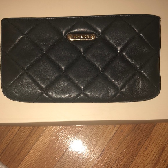 Michael Kors Handbags - Michael Kors black quilted clutch